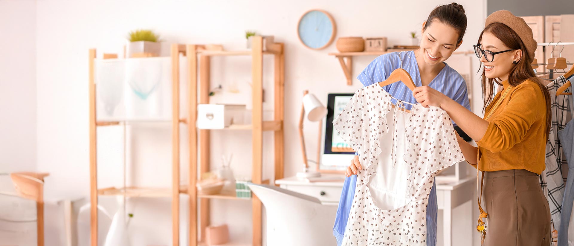 Where to buy safe textiles? Where to buy sustainable fashion? Shoppers looking at the tag of a dress in a store